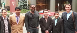 From the left: EunSu Lee, Sumadhur Shakya, Chijioke Ifepe, Poyraz Kayabas, Nimish Dharmadhikari, Luke Holt in front of the Minneapolis Convention Center.
